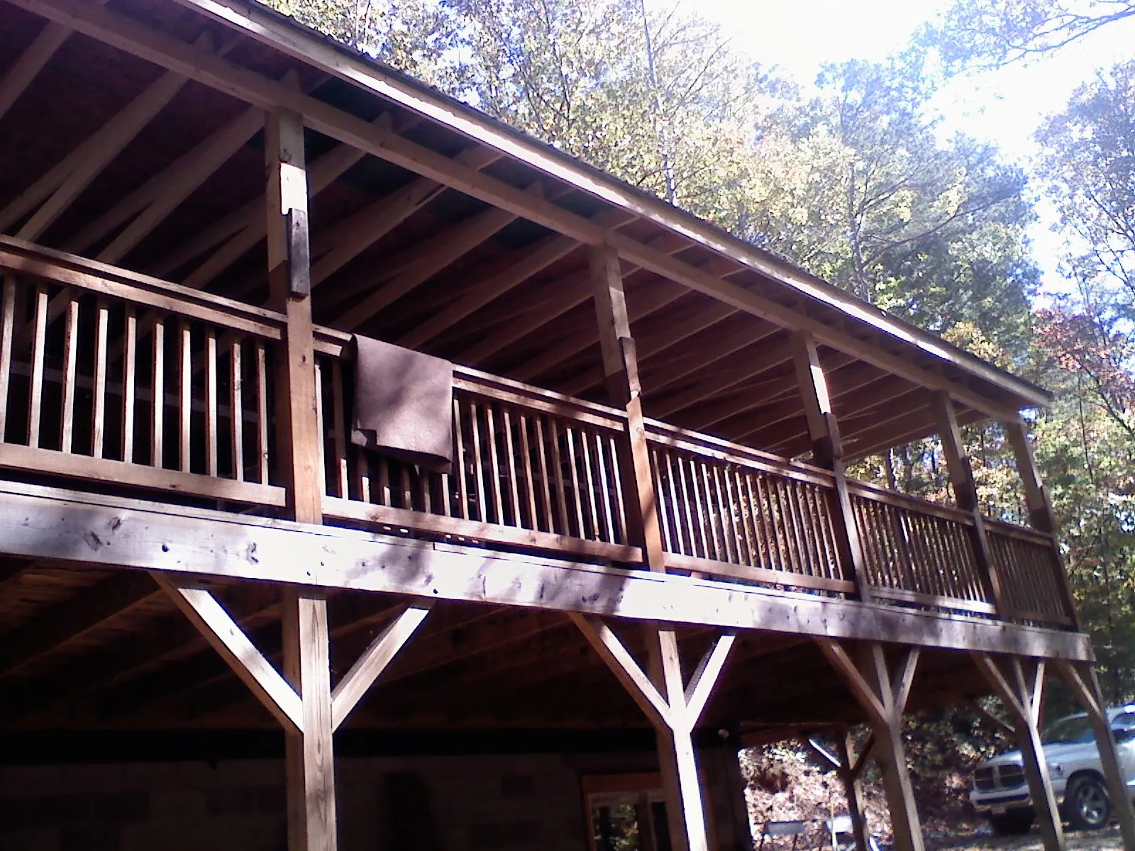 Timber framing under a new elevated porch and deck — Roof Leak Repair in Redding by Roofing Brothers